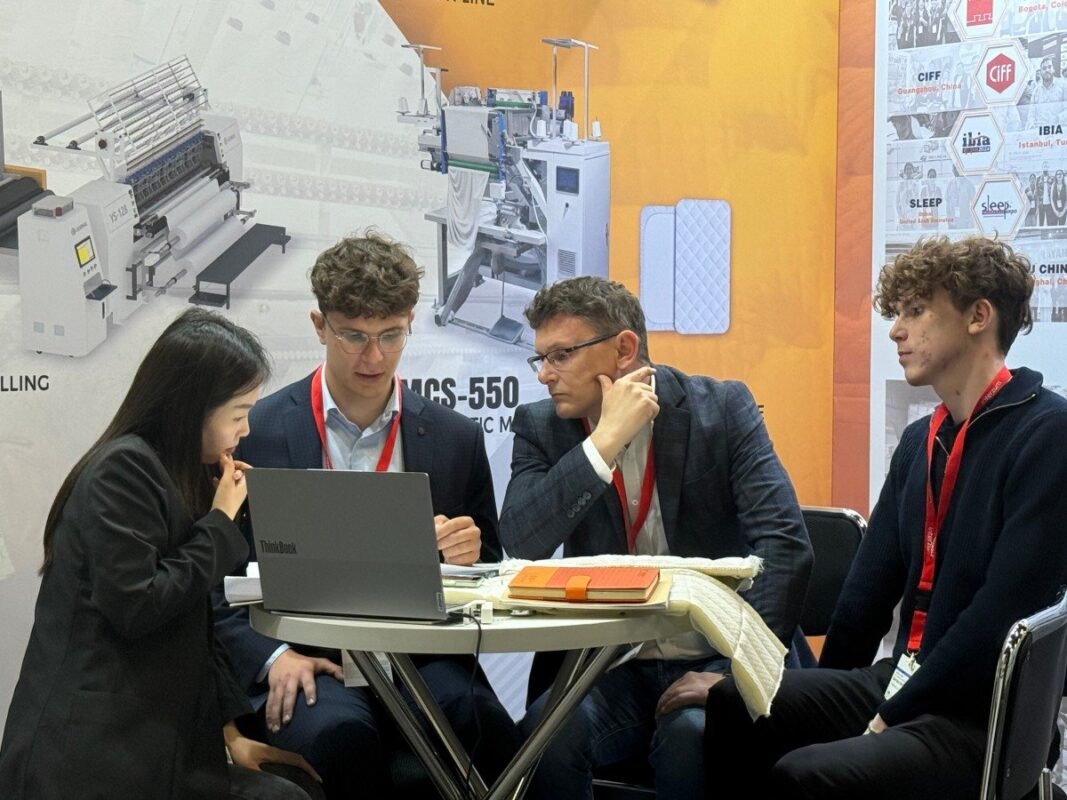 Dedicated consultation space at GENMAX's Interzum 2025 booth designed for in-depth technical discussions with mattress manufacturers.