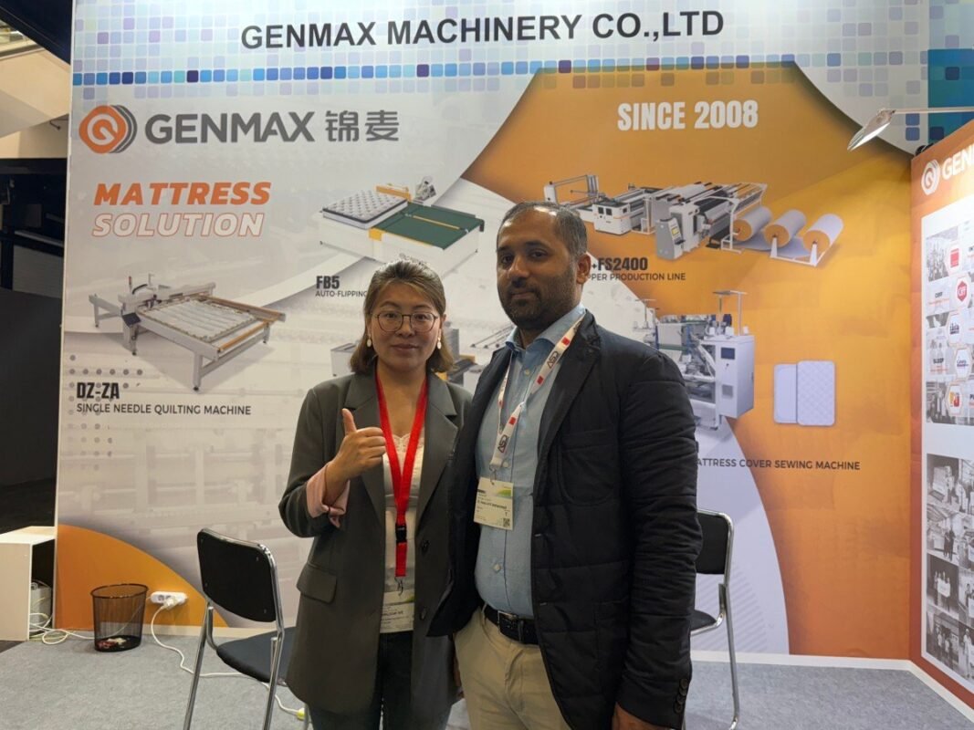 GENMAX's distinctive bright orange booth design that helps visitors easily locate their exhibition space at Interzum Cologne 2025.