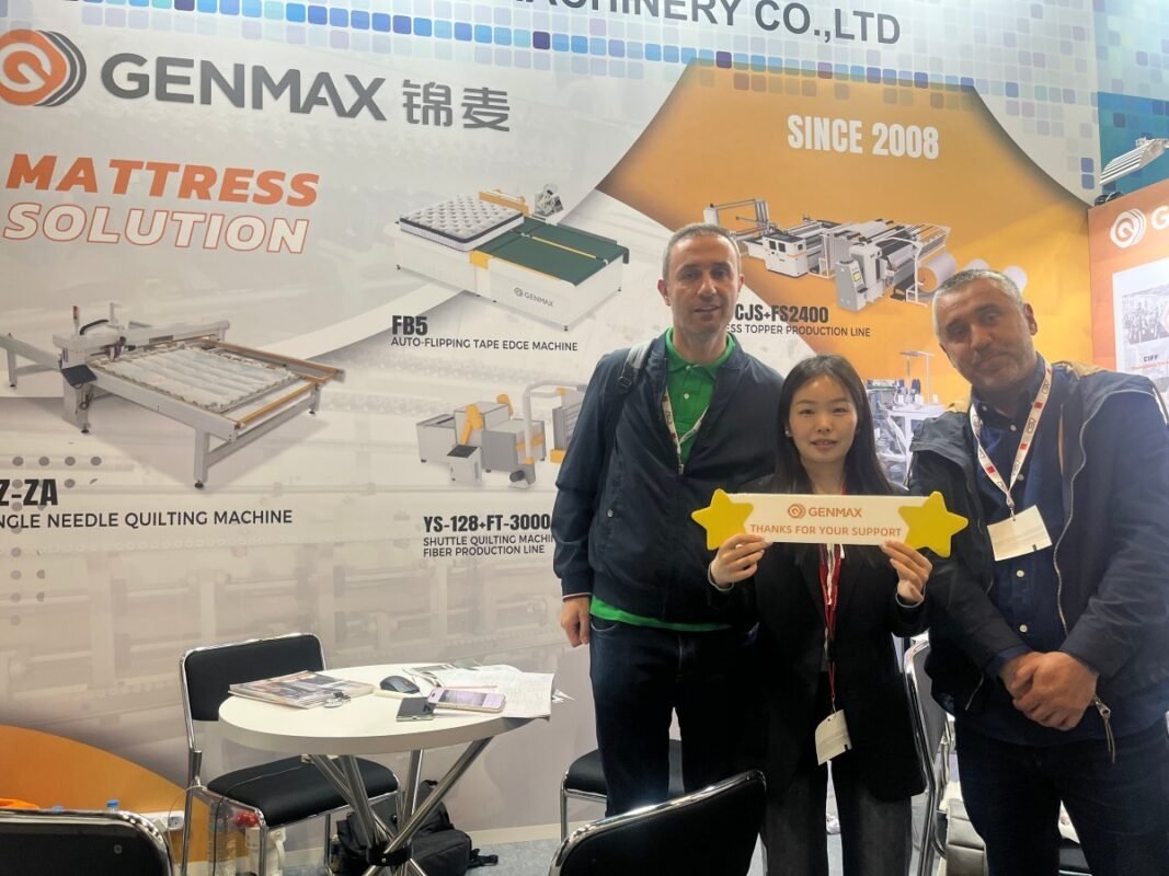 Furniture production clients gathered for a group photo with GENMAX representatives after discussing automation solutions at Interzum Cologne 2025.