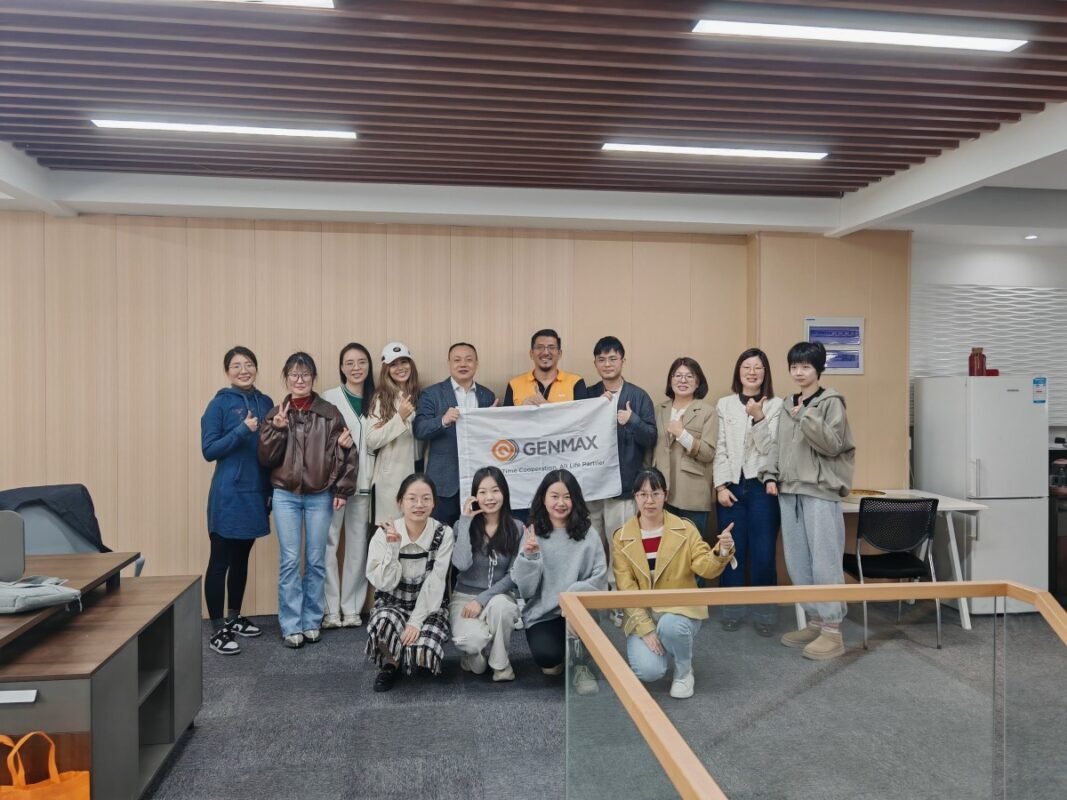 Leading mattress and textile manufacturers from Guatemala gathered for a formal group photograph with technical specialists at the quilting equipment company's main entrance after discussing advanced production solutions.