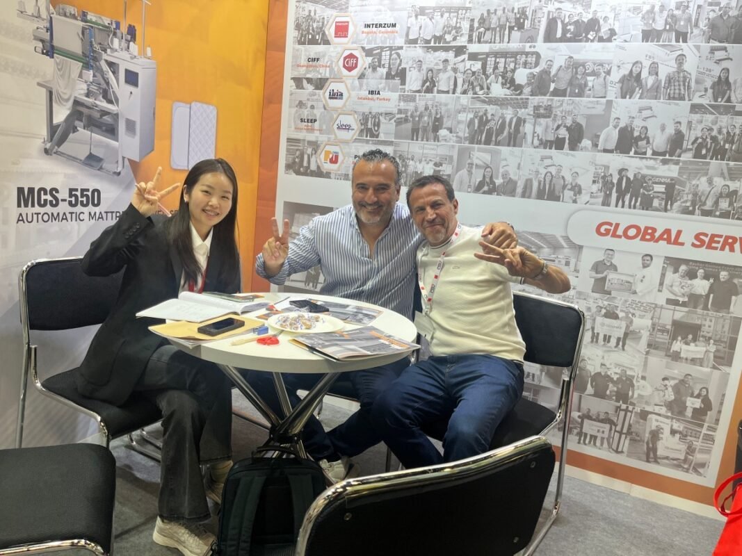 International furniture manufacturing consortium members and GENMAX leadership team documenting their meeting with a formal group photograph at Interzum Cologne 2025.